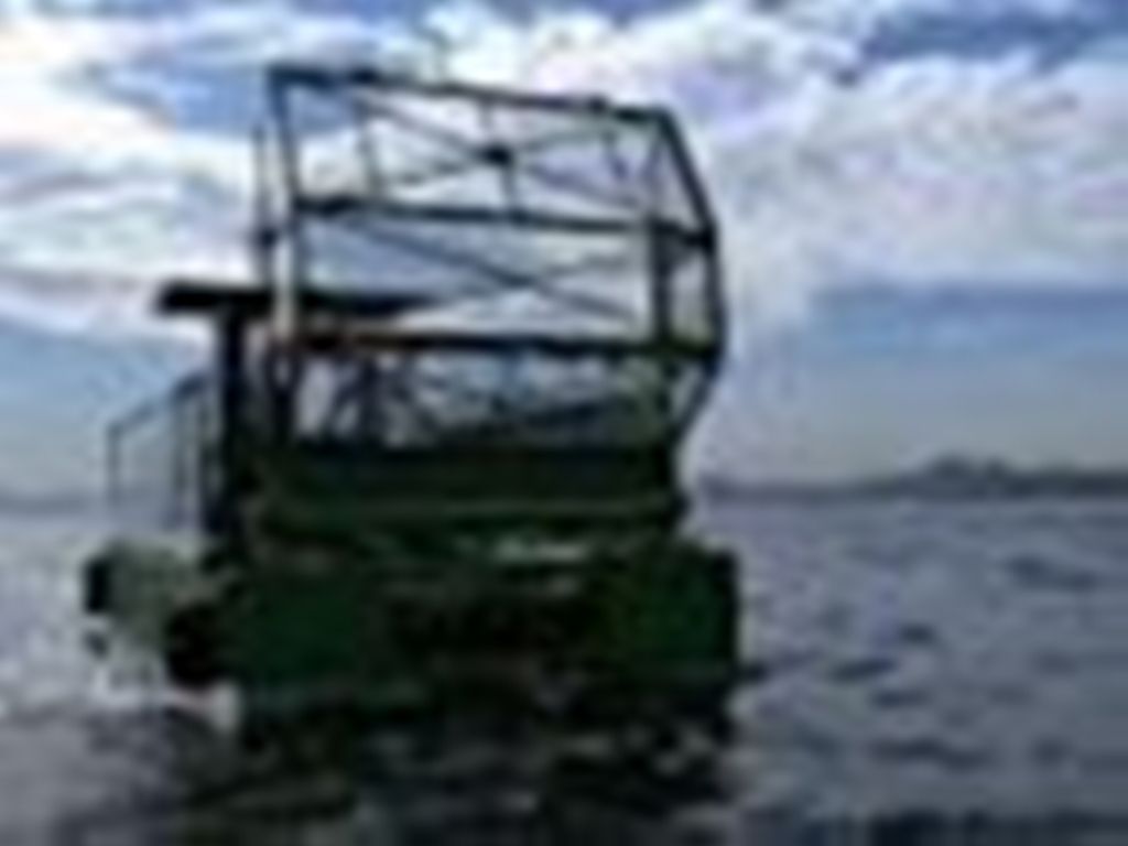  Экологичные лодки возобновили очистку Гуанабары  - фото 1