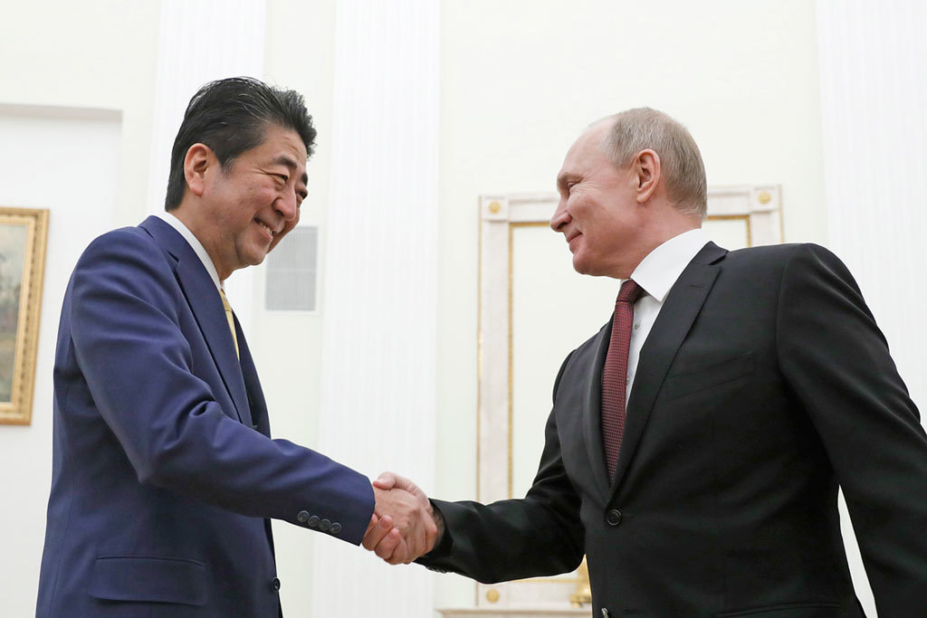 Путин и Абэ договорились о развитии экономических связей и экологического сотрудничества между Россией и Японией - фото 1