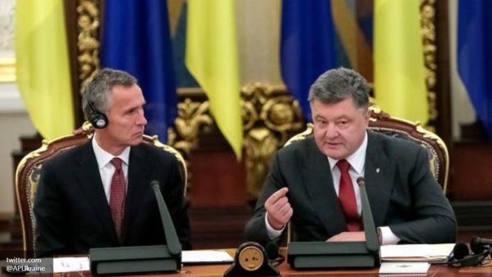 710x400 1443426328 petr-poroshenko yensom-stoltenberg gensek-nato